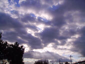 face image in the clouds